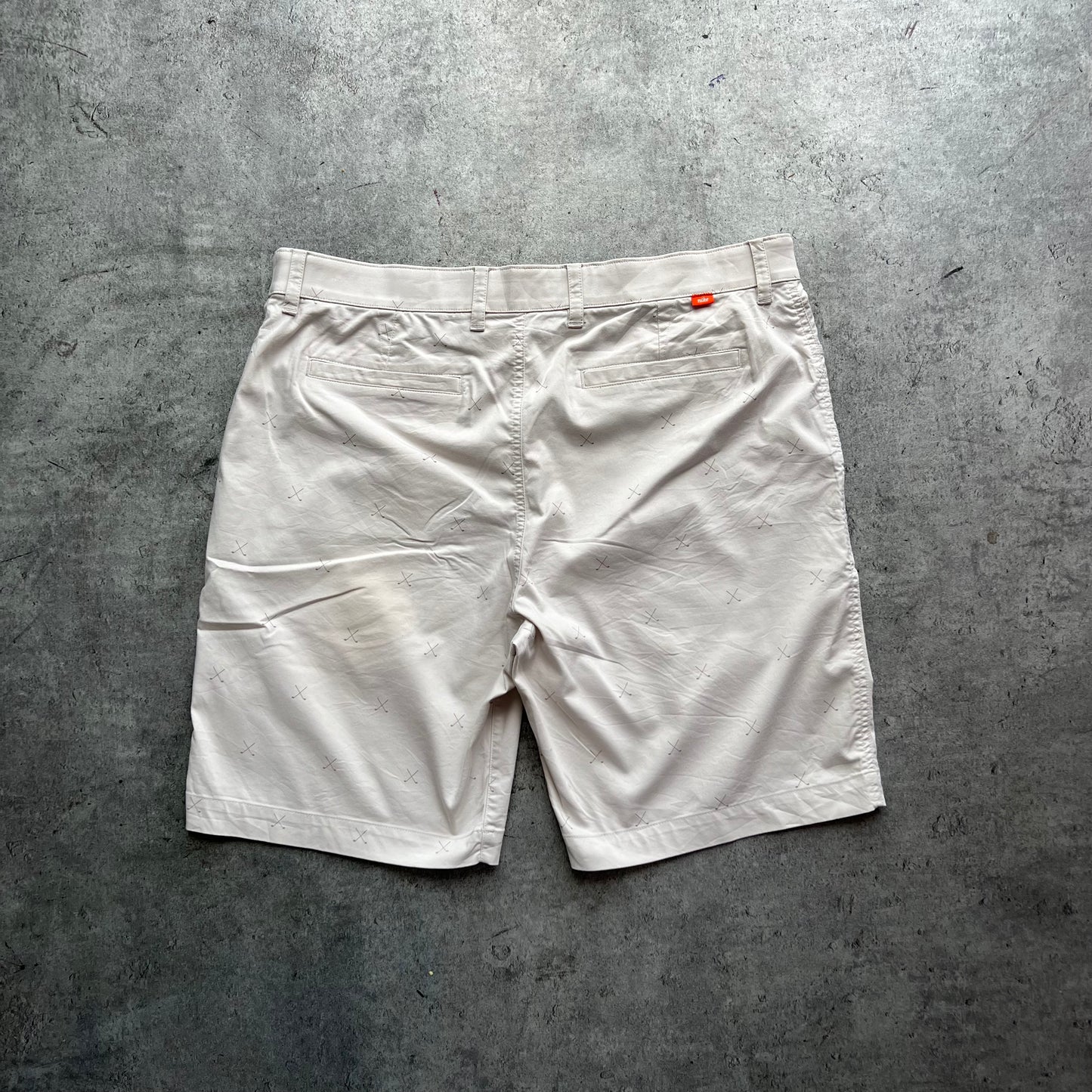 White Nike Golf Motive Shorts