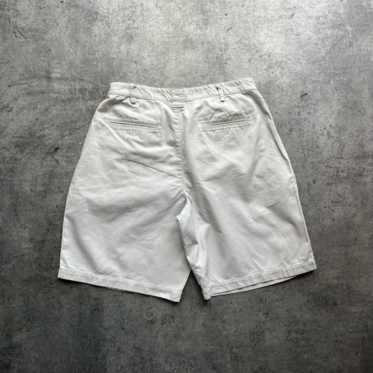 White Nike Golf Motive Shorts